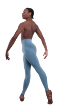 Men’s ballet dance tights – light blue. Male dancer in a ballet pose wearing high-quality, comfortable, and stretchy dance tights for performance and practice.